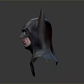 Man Wearing Detailed Batman Mask With Gray Costume And Yellow Logo