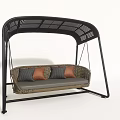 Outdoor Woven Swing Chair With Black Metal Frame Arched Canopy And Gray Brown Cushions