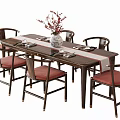 Dark Wood Dining Table Set With Six Red Padded Chairs White Vase Red Branches Tableware