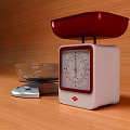 Commercial Kitchen Weighing Scales With Mechanical Red Bowl And Digital Glass Bowl On Wooden Tabletop