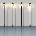 Four Black Illuminated Street Lamps Standing On Smooth Floor With White Wall Background