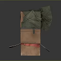 Open Corrugated Cardboard Box With Red Cloth Inside And Green Cloth Beside
