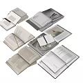 Collection of Open Books And Magazines With Stacked Layouts And Varied Pages