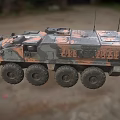 Tactical Armored Military Vehicle With Camouflage Paint Multiple Wheels And Antennas