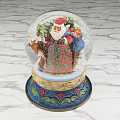 Decorative Ornament Set Featuring Santa Claus Child Reindeer in Snow Globe with Colorful Decorative Base