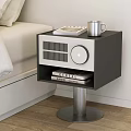 Modern Black White Bedside Table With Silver Mug Notebook Radio Books on Metal Stand