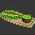 Fresh Croissant Sandwich With Lettuce Tomato Cheese And Green Sauce On Wooden Tray