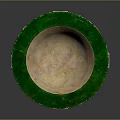 Round Decorative Table With Green Edge Light Interior Four Column Legs And Square Bases