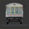 Vintage Model Caravan With Blue Roof Green Pink Stripes And Decorative Patterns On Gravel Base
