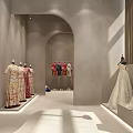 Elegant Bridal Shop Interior With Wedding Dresses On Mannequins And Display Racks