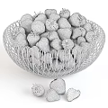 Fresh Ripe Strawberries in Silver Wire Mesh Bowl with Green Leaves and Sliced Pieces Scattered