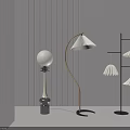 Contemporary Floor Lamps With Sleek Curved Stand Spherical Shade And Tiered Design For Home Interior