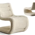 Modern Plush Lounge Chair With Curved Design And Sleek Integrated Structure