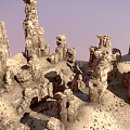 Scenic Natural Landscape With Unique Rock Pillars And Eroded Stone Formations Under Pink Sky