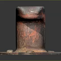 Rusty Red And Black Metal Bollard With Circular Base And Bolts