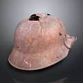 Rusty Old Damaged Military Helmet With Metal Surface And Historical War Relic