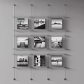 Black And White Landscape Paintings Hanging On Wall With Metal Support Frames 3d model
