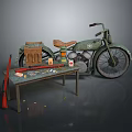 Vintage Green Motorcycle With Brown Seat And Wooden Table With Oil Lamp Tools