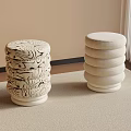 Cream Colored Sofa Stools With Carved Patterns And Stacked Round Design On Carpet 3d model