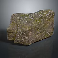 Natural Rustic Stone Piece With Rough Surface Green Mossy Spots And Earthy Tones