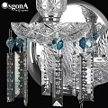 Elegant Crystal Wall Sconce With Candle Shaped Bulbs Ornate Decorations And Hanging Tassels