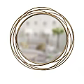 Round Gold Framed Mirror With Multiple Layers Of Lines On Gray Background