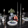 Elegant Tableware Set With Plates Napkins Wine Glasses Candles Plant And Pomegranates On Dining Table