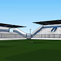Outdoor Football Field With Green Turf Stadium Stands And Palm Trees Under Clear Blue Sky