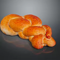 Freshly Baked Braided Bread With Shiny Golden Brown Crust And Soft Texture