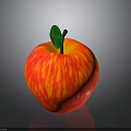 Fresh Red and Yellow Striped Apple with Green Leaf and Brown Stem on Dark Background