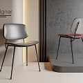 Designer Modern Leisure Chairs With Black Metal Legs Gray And Pink Seats In Studio Setting