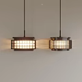 Two Modern Grid Design Pendant Lights Emitting Warm Light Against White Wall 3d model
