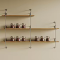 Multi Tier Wall Mounted Wooden Shelves With Glass Jars And Red Spices