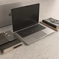 Modern Silver Laptop With Leather Notebook Phone Stand And Accessories