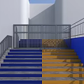 Colorful Staircase With Blue And Yellow Steps Metal Railings And White Walls