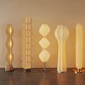 Stylish Modern Table Lamps With Unique Curved Shapes And Beige Fabric Shades