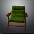 Comfortable Green Padded Chair With Red Wooden Armrests And Legs