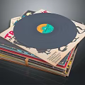 Vintage Vinyl Record Resting On Stack Of Colorful Album Covers