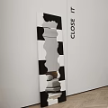 Wavy Black And White Mirror Frame With Close Text Beside Gray Cushion Reflection