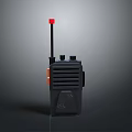 Black Walkie Talkie Electronic Device Featuring Red Antenna And Control Buttons