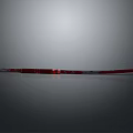 Red And Silver Long Sword With Metallic Finish Shiny Blade On Gray Background