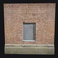 Traditional Red Brick Building Exterior Wall With Small Window And Concrete Base