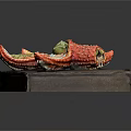 Colorful Decorative Starfish Ornament With Red Yellow Green Petals On Brown Box