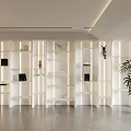 White Marble Shelving Unit With LED Lighting And Decorative Items In Modern Interior Design