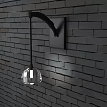 Modern Black Metal Wall Sconce With Transparent Spherical Lampshade On Dark Brick Wall