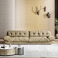 Double Sofa Plush Beige Fabric For Cozy Modern Living Room With Bookshelf And Natural Light