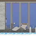 Modern Poolside Lounge Chair With Small Table By Large Windows At Night