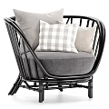 Black Rattan Leisure Chair With Gray Cushion And Plaid Beige Pillows