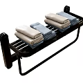 Black Wall Mounted Towel Rack With White And Blue Folded Towels