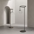 Modern Floor Lamps With Glass Shades And Metal Stands In Minimalist Interior